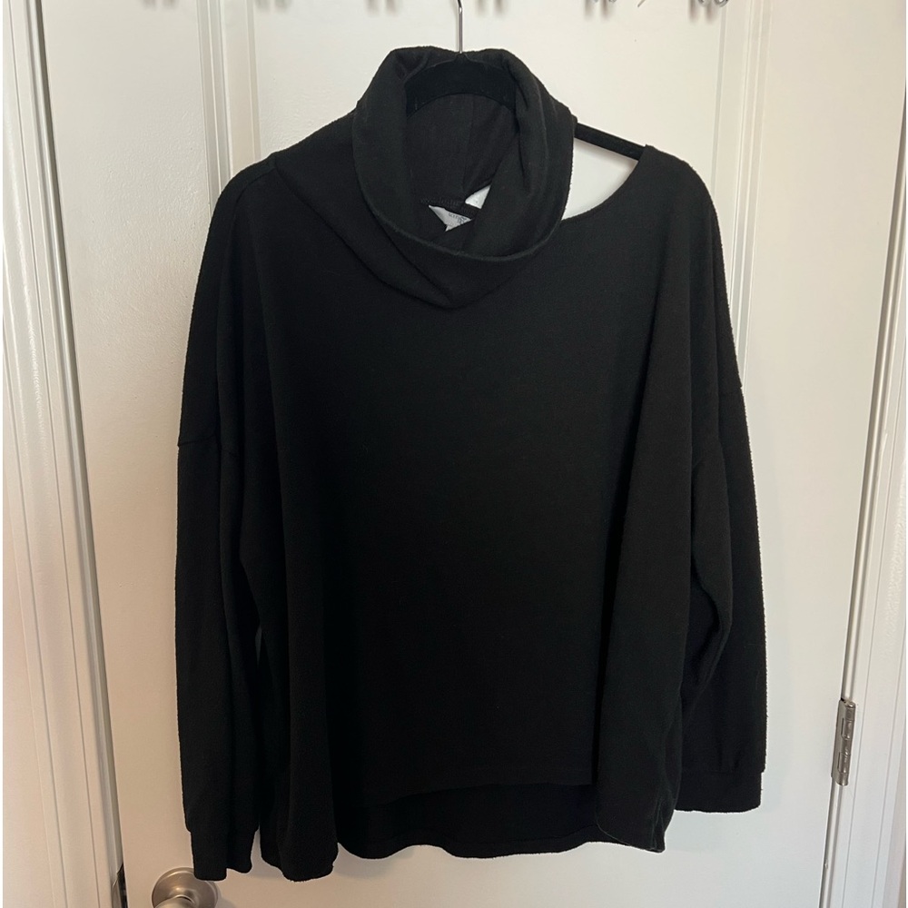 Turtle neck sweater with cold shoulder detail